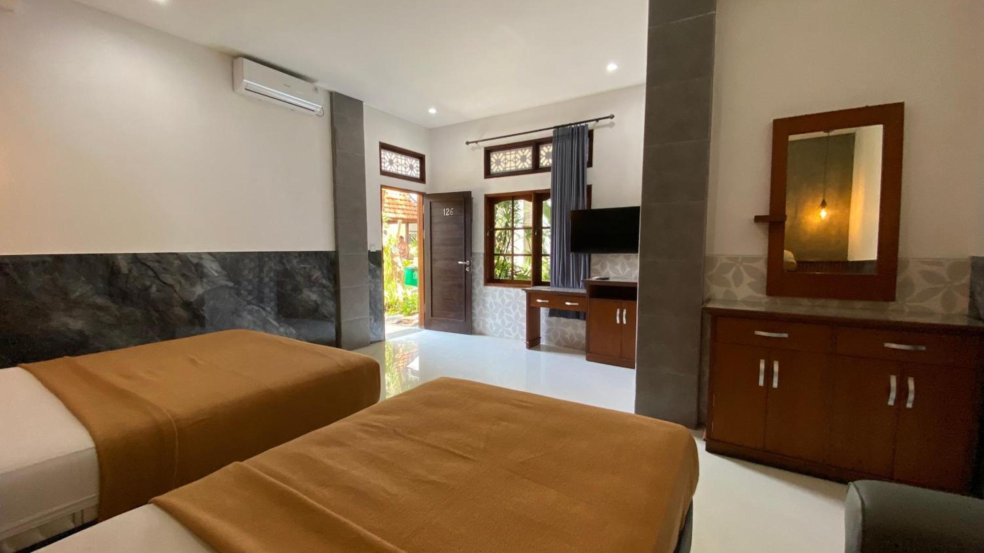 Sandat Hotel Legian Buitenkant foto