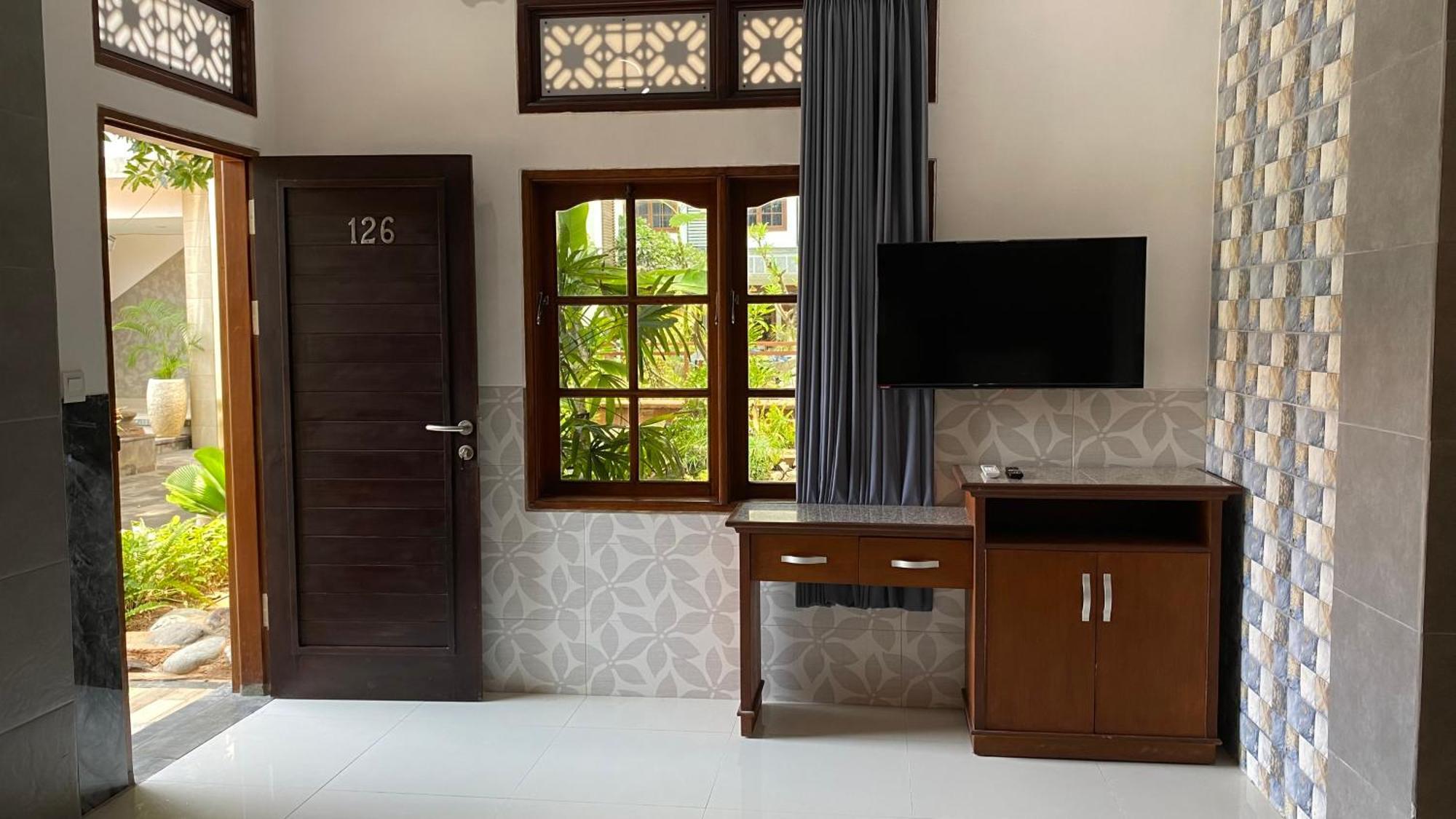Sandat Hotel Legian Buitenkant foto